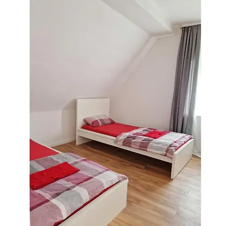 Beth Im Dachgeschoss Mit Balkon